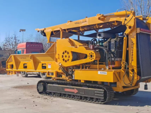 Tracked horizontal grinder side view in the WeiDong yard